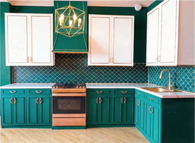Featured photo from Designer Emerald Kitchen Studio with Gold Accents
