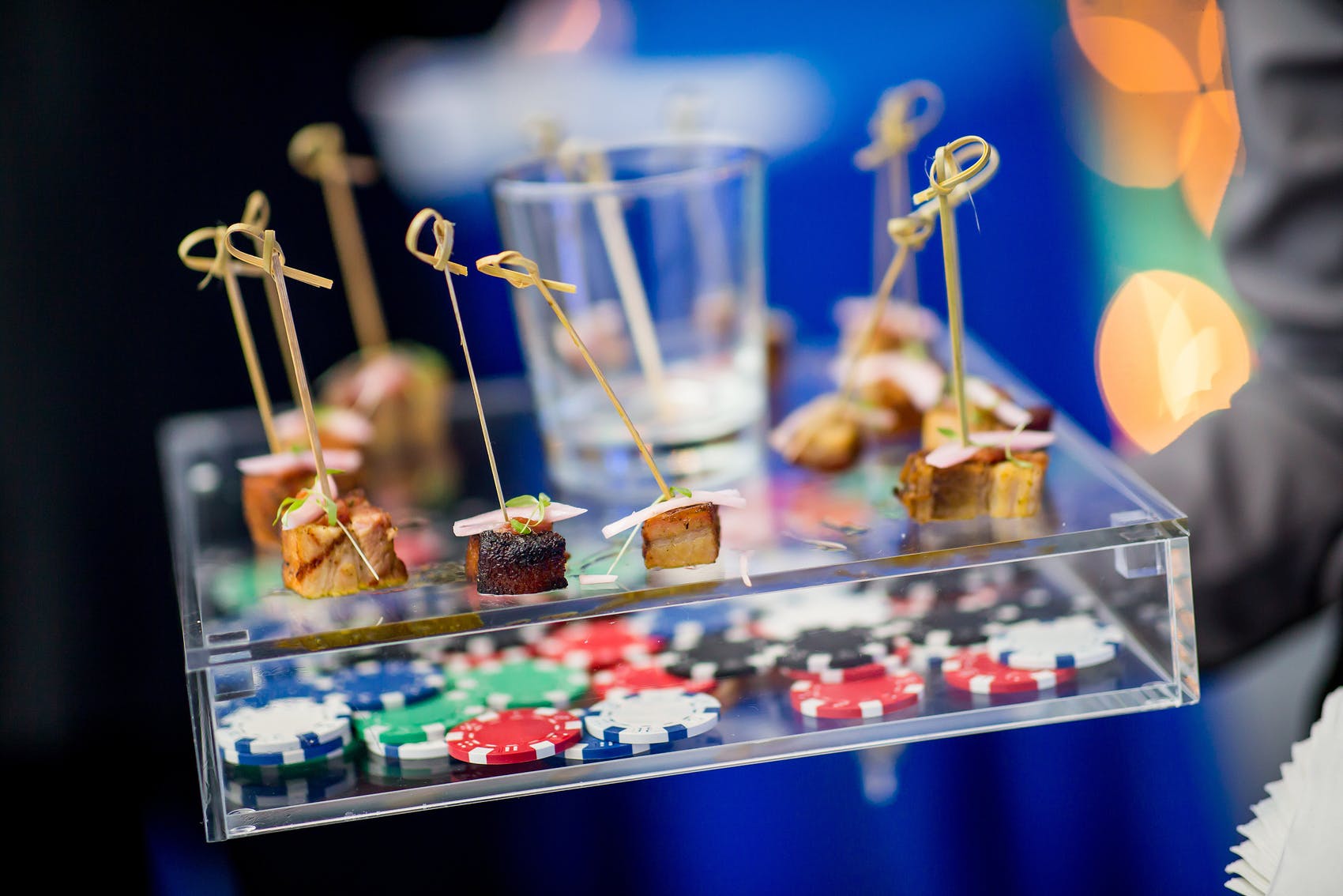 Appetizers on casino chip serving trays