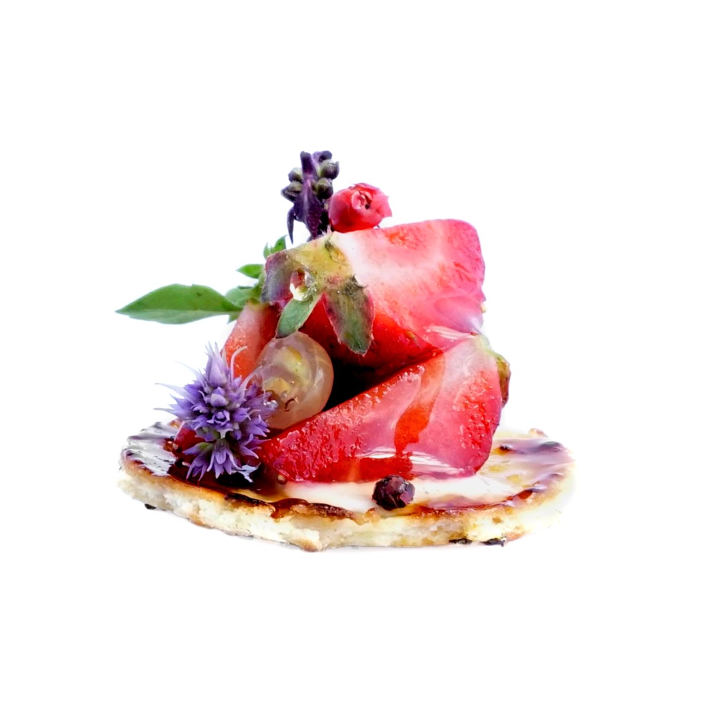 passed bite of strawberry and edible florals on cracker