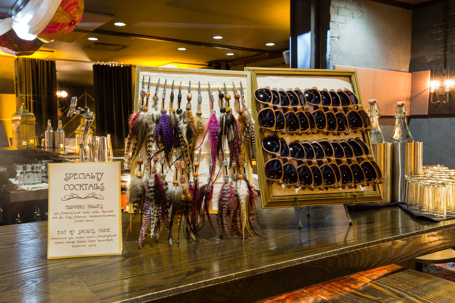 Sunglasses and feather-clip party favors