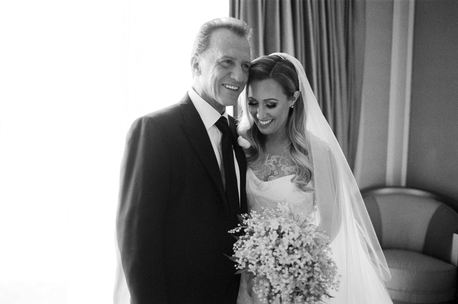 black-and-white portrait of bride with father