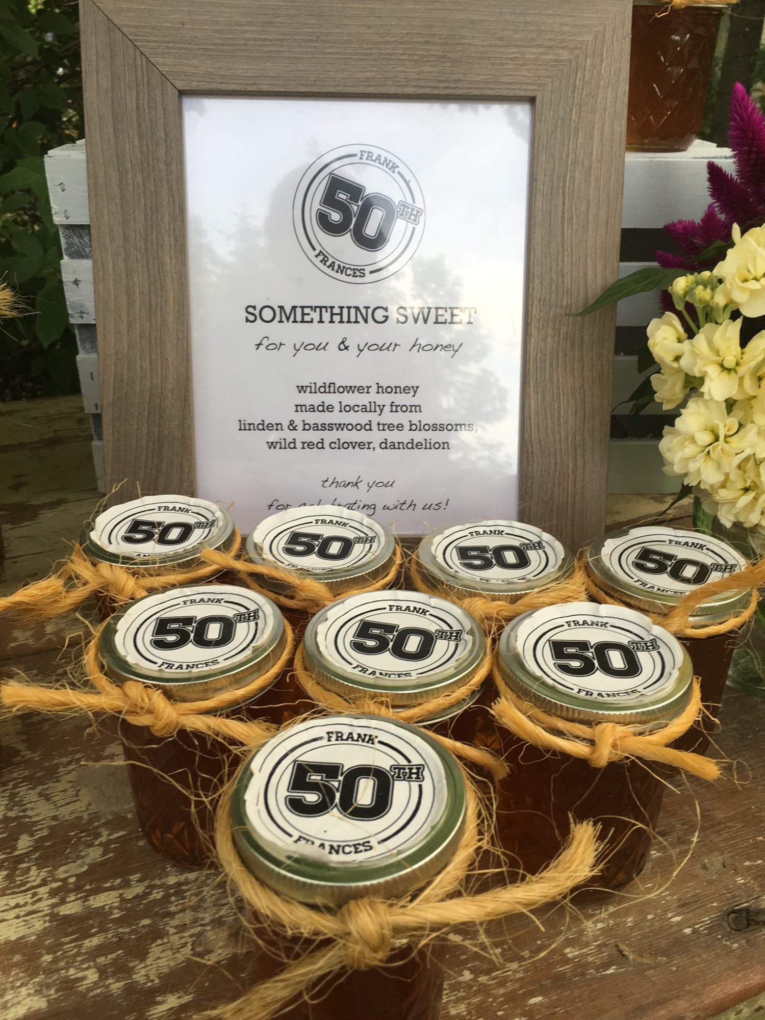 Jars of honey party favors for 50th-birthday party
