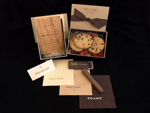 50th-birthday party invitation and party favors of chocolate chip cookies and cigars