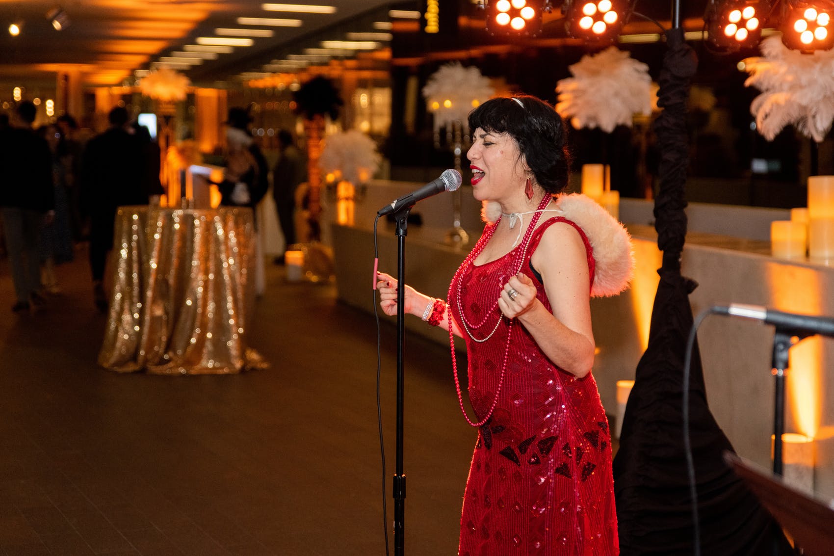 singer in 20s themed costume at celebration