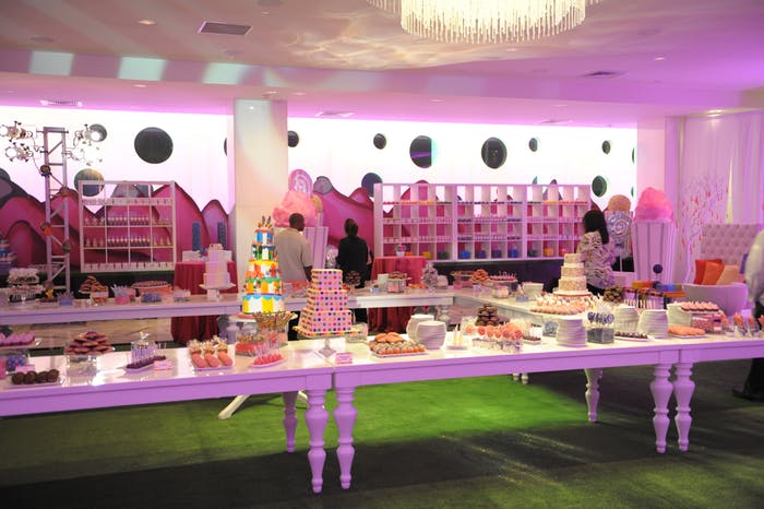 pink background with candy table