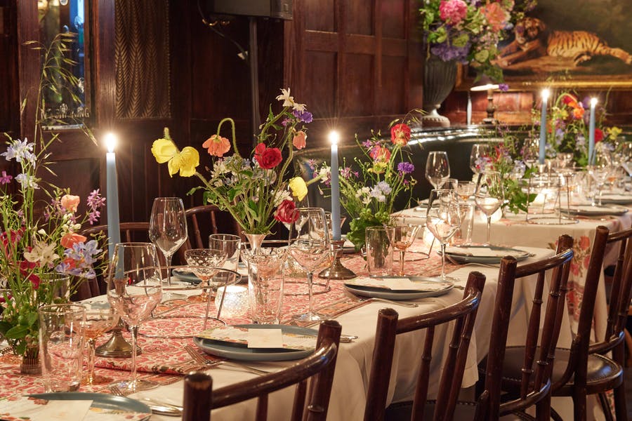 Birthday Tablescape with Colorful Floral Centerpieces | PartySlate