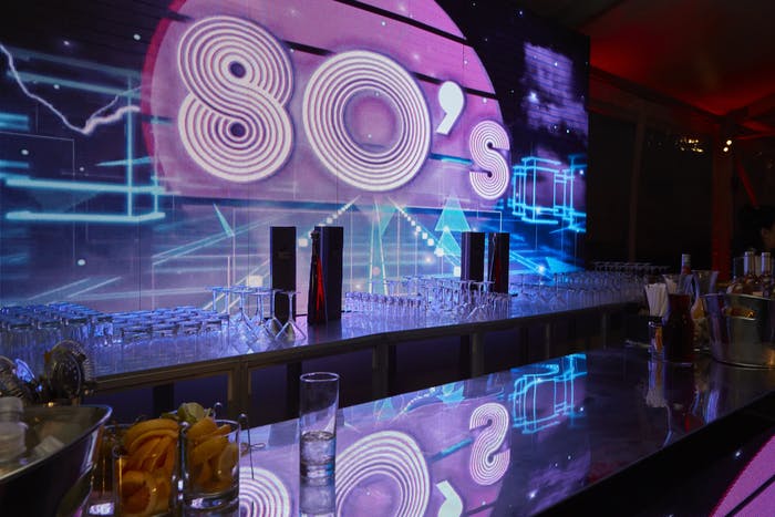 Neon 80s Themed Birthday Party Stage | PartySlate
