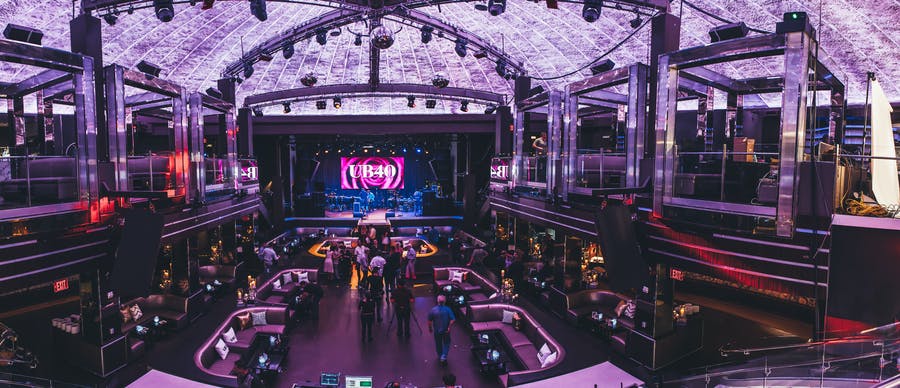 50th Birthday Party With Soaring Ceilings and Impressive Staging | PartySlate