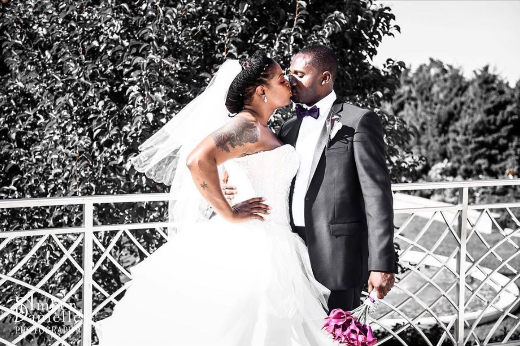 bride and groom kiss