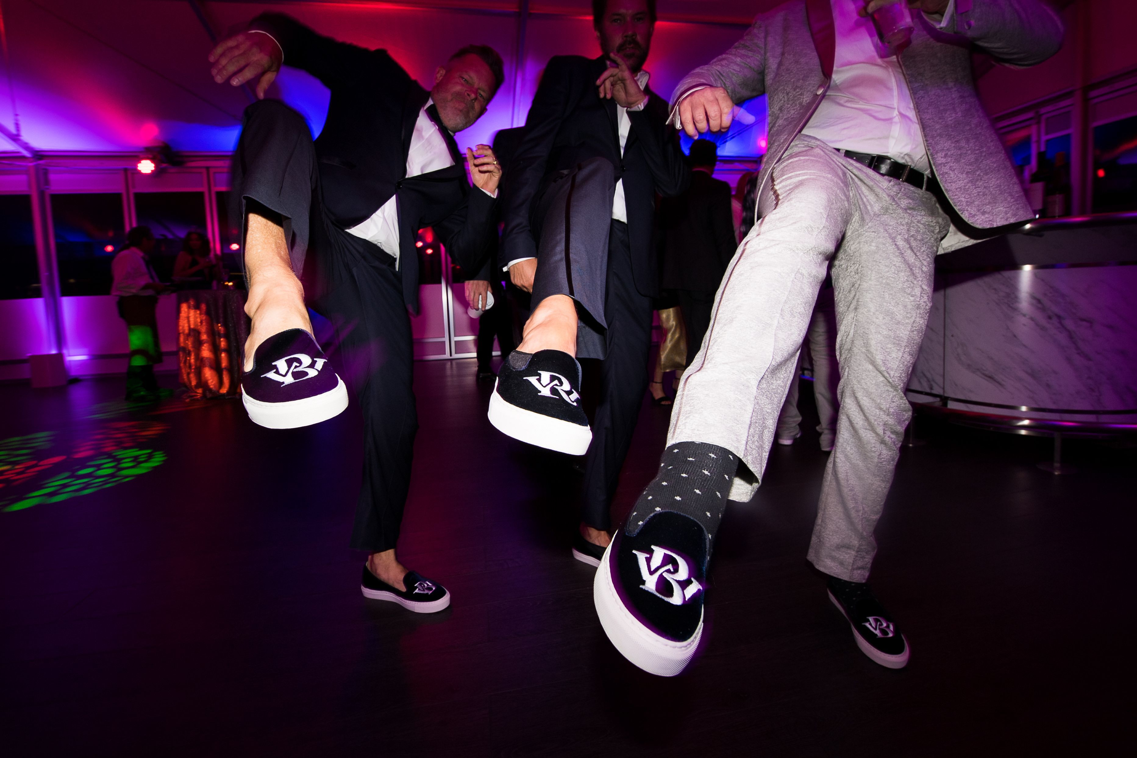 Custom embroidered velvet sneakers for cannabis wedding.