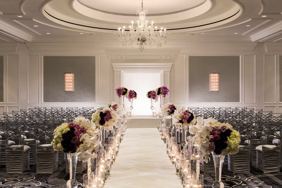 San Francisco Wedding Venue aisle with purple and white floral | PartySlate