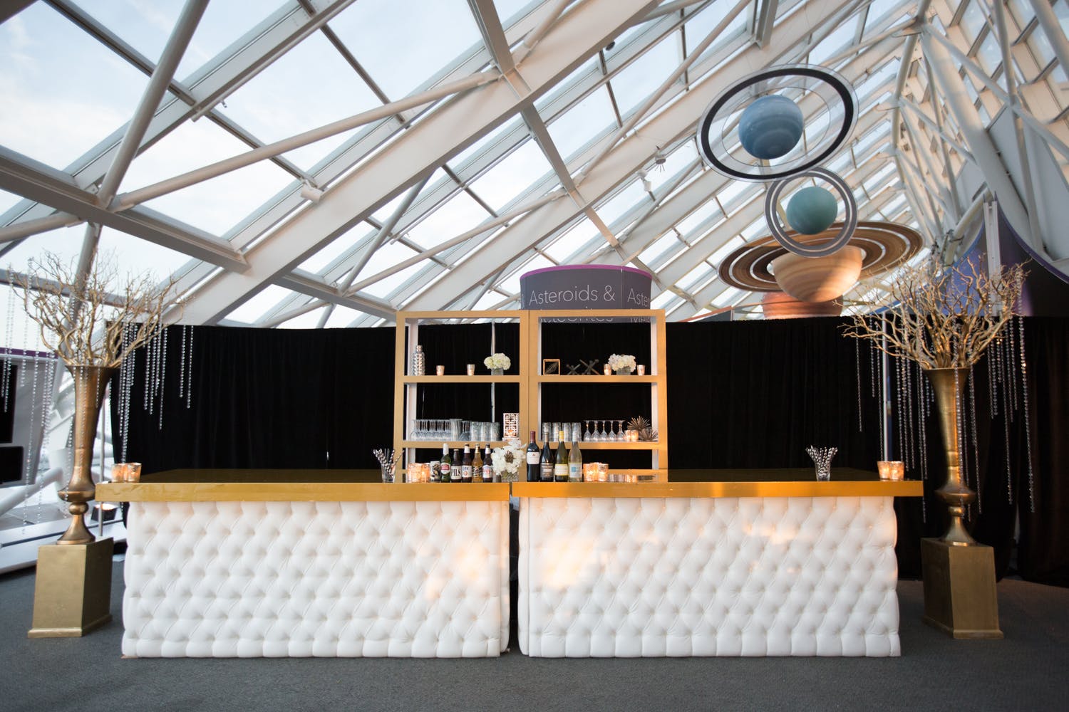 Planetarium Wedding With Black and White Bar Area | PartySlate
