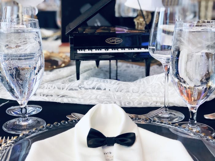 White suite and blow bowtie mini place settings for a Gatsby wedding | PartySlate