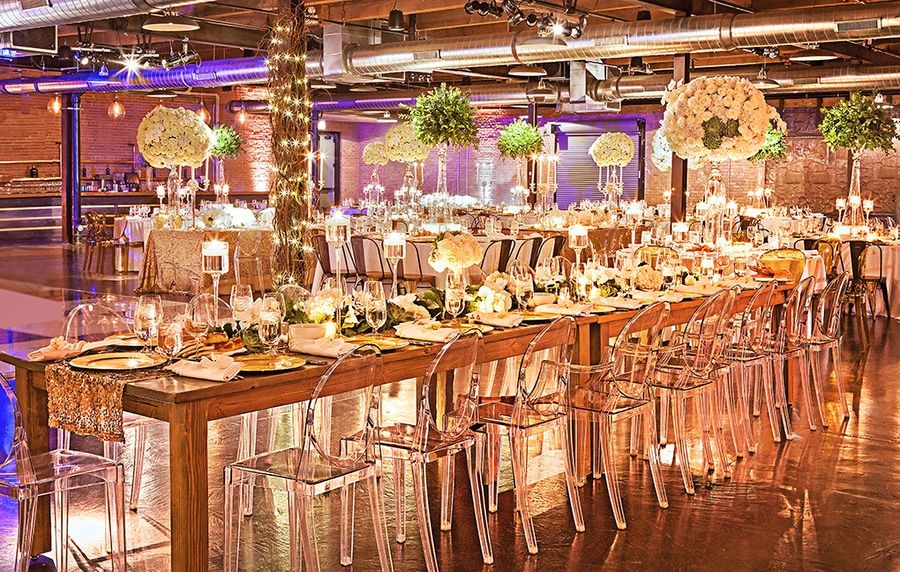Wedding Reception With Acrylic Chairs and Tall Green and White Centerpieces at Morgan Manufacturing in West Loop Chicago | PartySlate