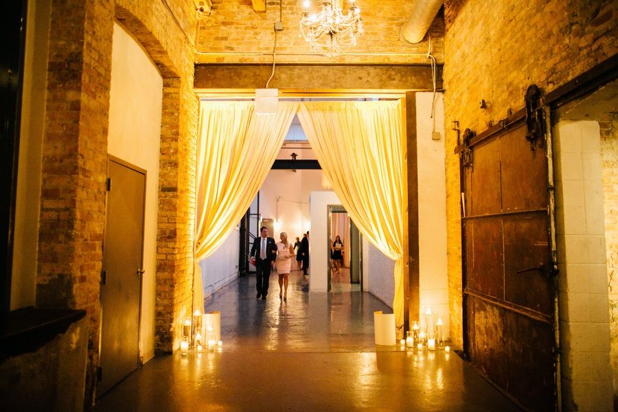 Chicago West Loop Wedding Venue Moonlight Studios With Gold Lighting and Candles | PartySlate