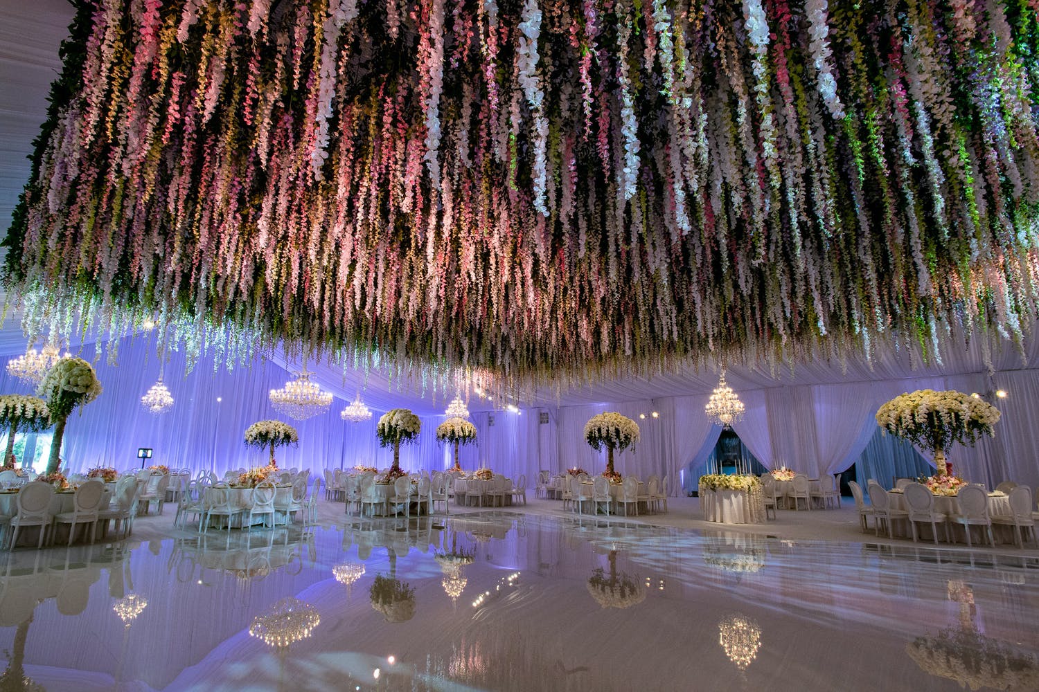Wedding Ballroom With Mirrored Dance Floor and Floral Fringe Wedding Ceiling Decorations | PartySlate