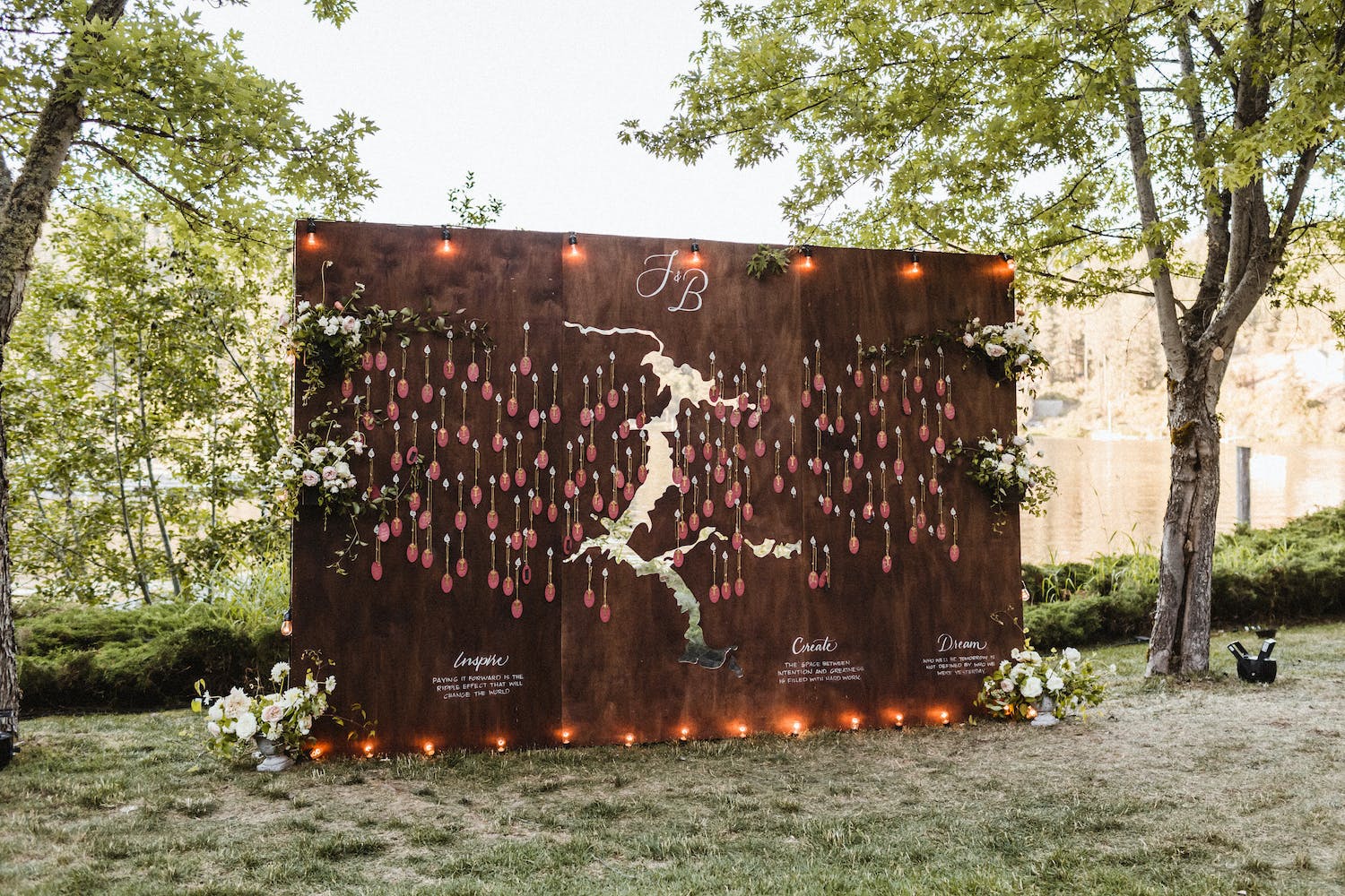 Brown Wedding Seating Chart With White Representation of Coeur d’Alene River and Harrison Slogh | PartySlate