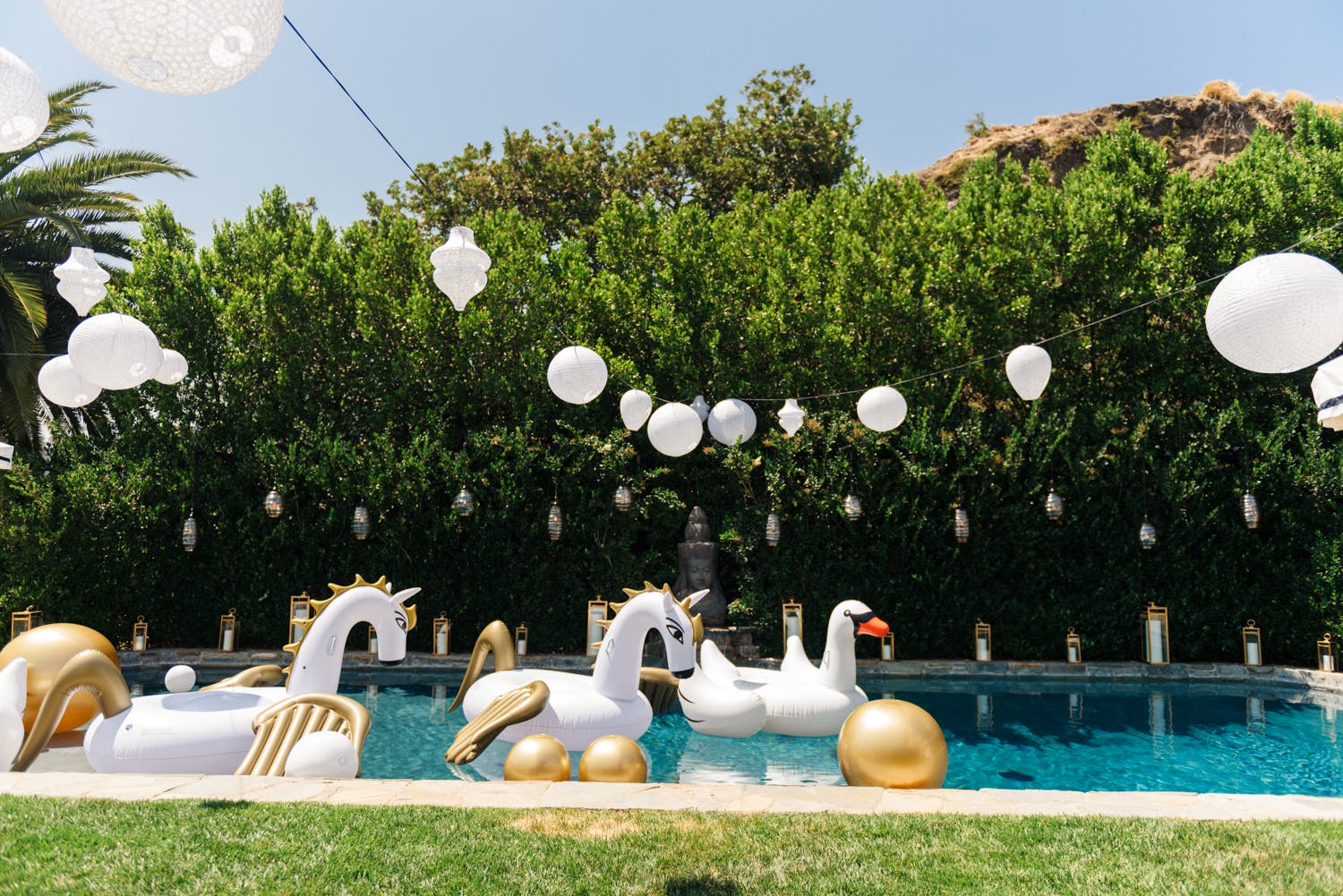 Backyard Pool Party With Unicorn and Swan Floaties | PartySlate