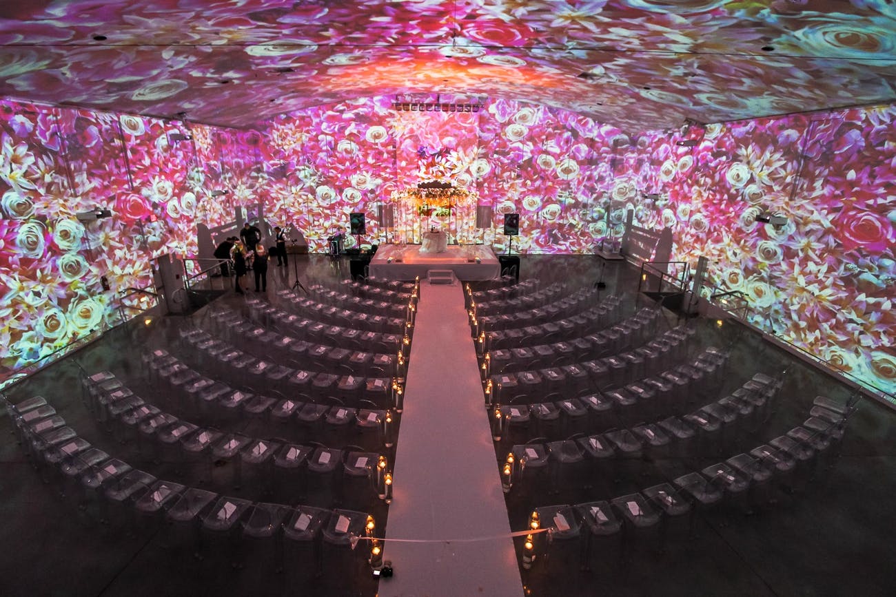 Miami wedding venue with floral print portrayed onto plain walls | PartySlate