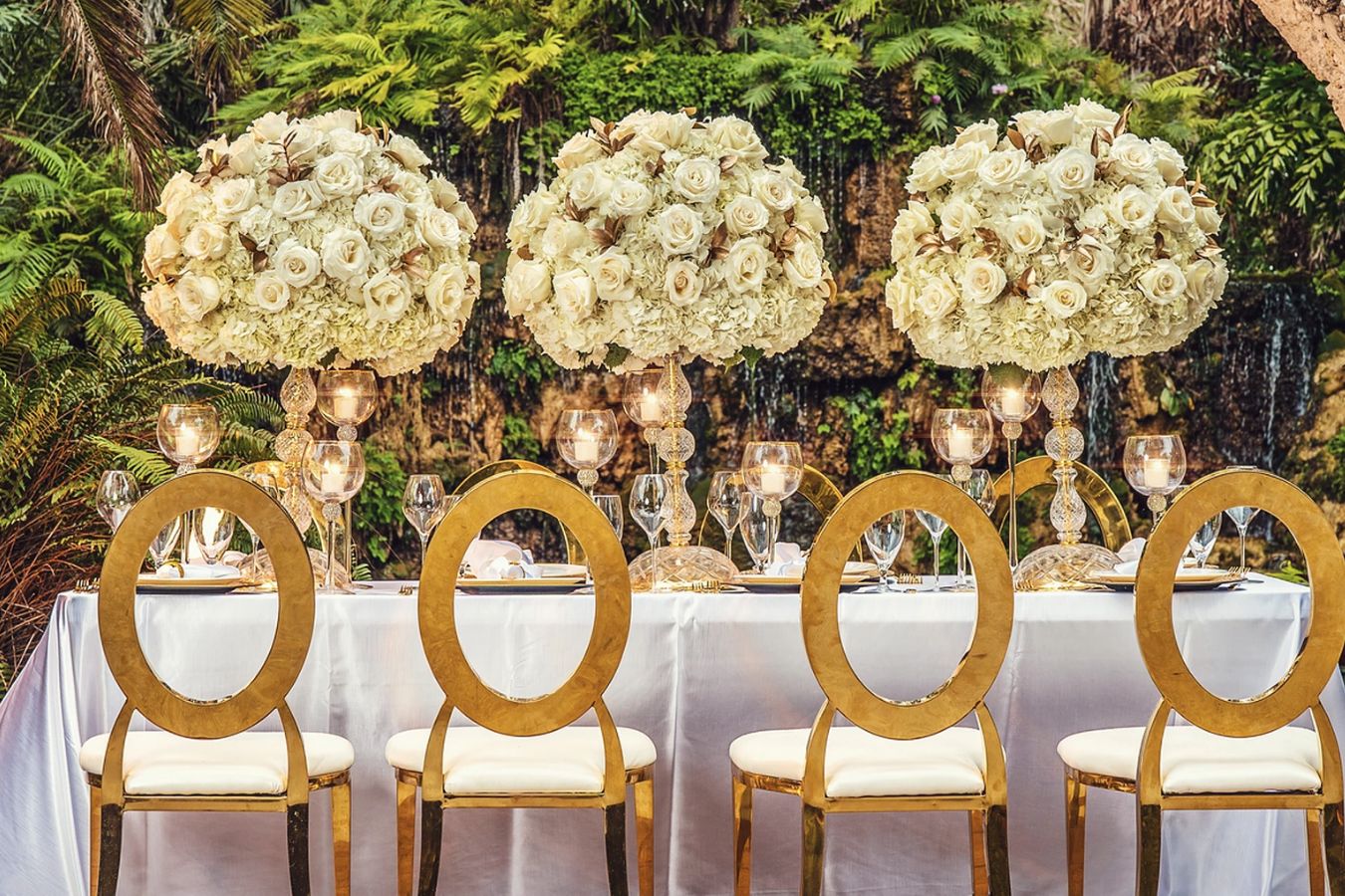 Wedding Tablescape With Gold Seating and Elevated White Floral Centerpieces | PartySlate
