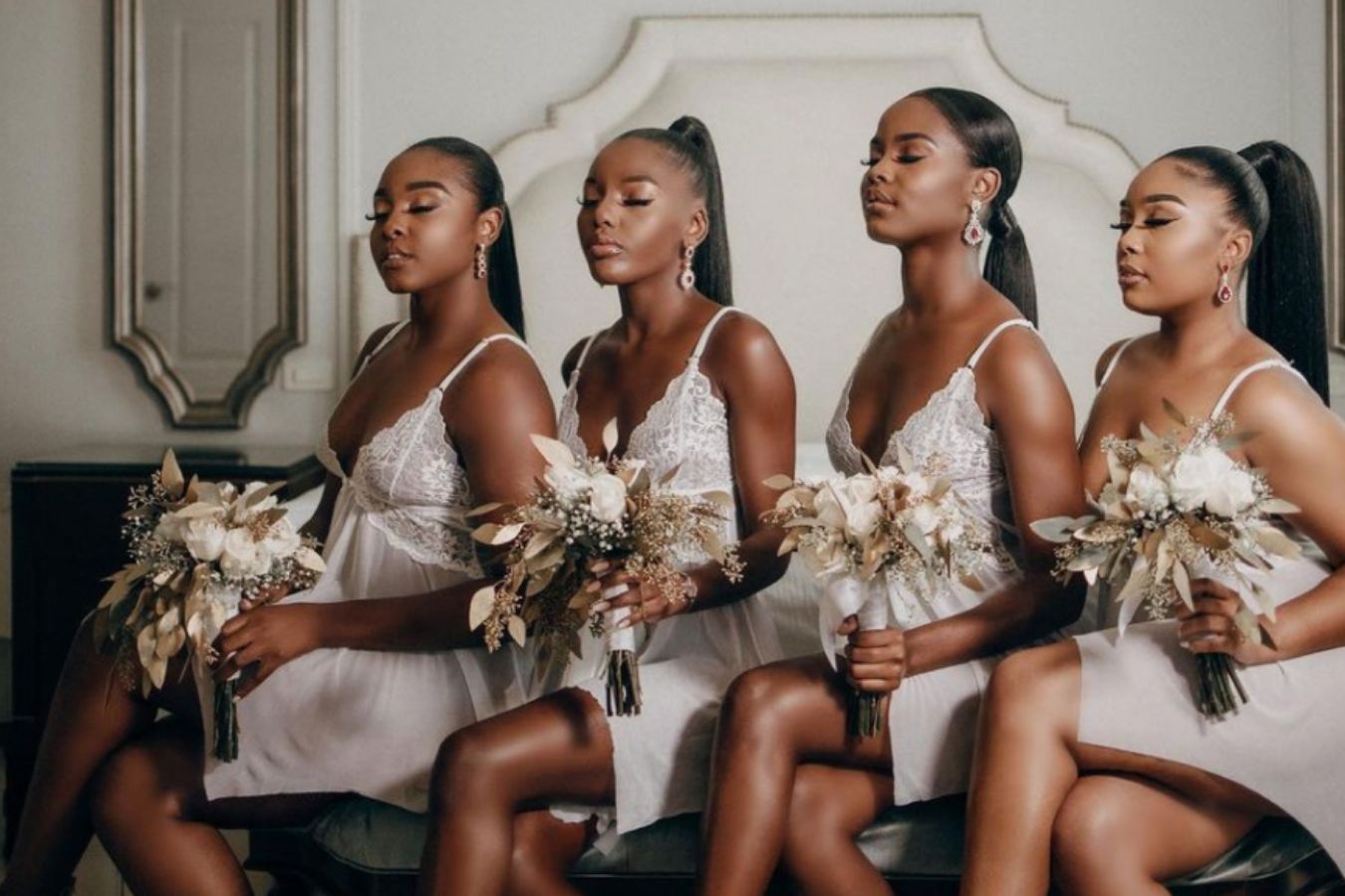 Four Bridesmaids Pose With Hair and Makeup Done | PartySlate