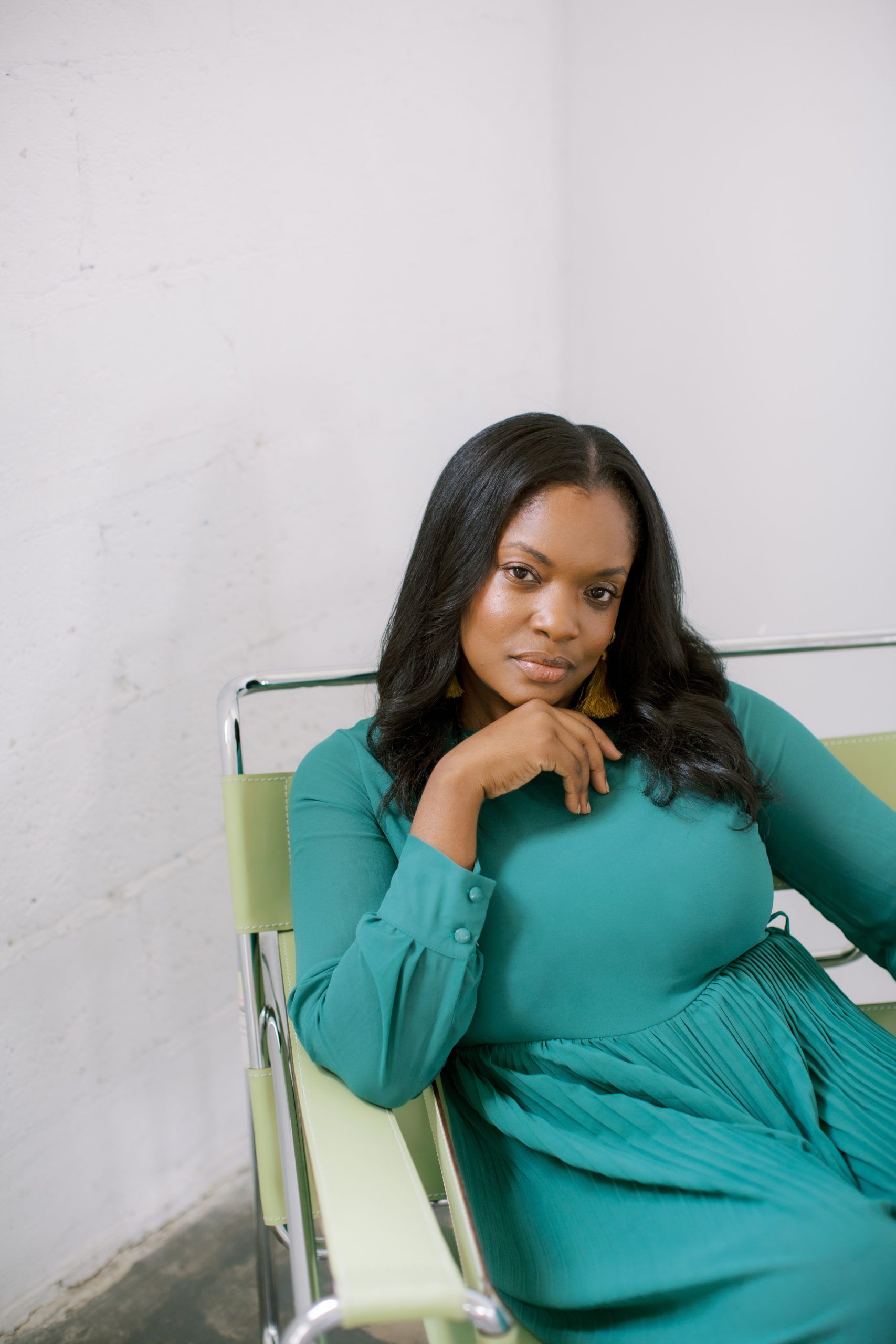 Natalie Thames of Déjà vu Sweets Wears a Green Dress | PartySlate