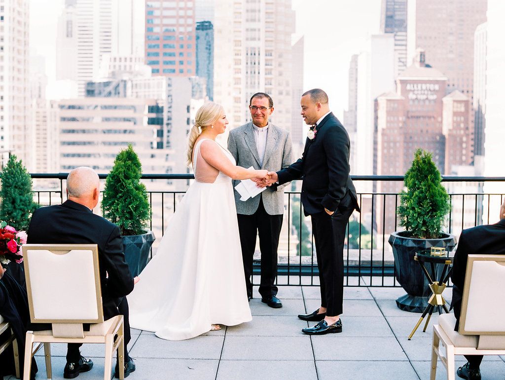 Bride and Groom Exchange Vows at Intimate Rooftop Wedding Ceremony at The Gwen, a Luxury Collection Hotel, Chicago