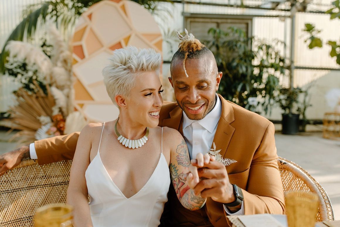 Bride and Groom Hold Hands at Outdoor Wedding at Plantenders Nursery in Silverado, CA | PartySlate