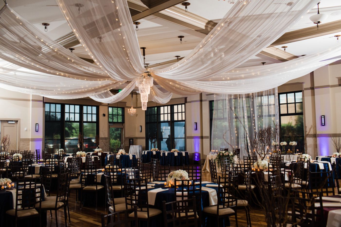 Wedding with ceiling drapery planned by Beck&Call Events of Houston | PartySlate