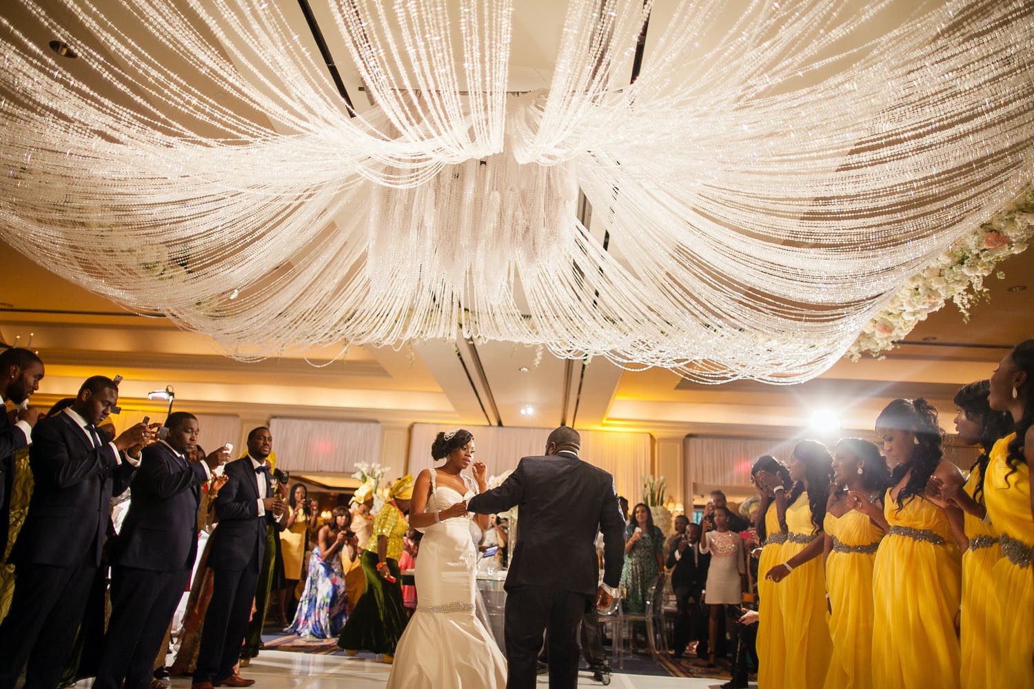 Wedding With Shimmering Tassel Ceiling Installation Planned by Doyin Fash Events of Houston, TX | PartySlate