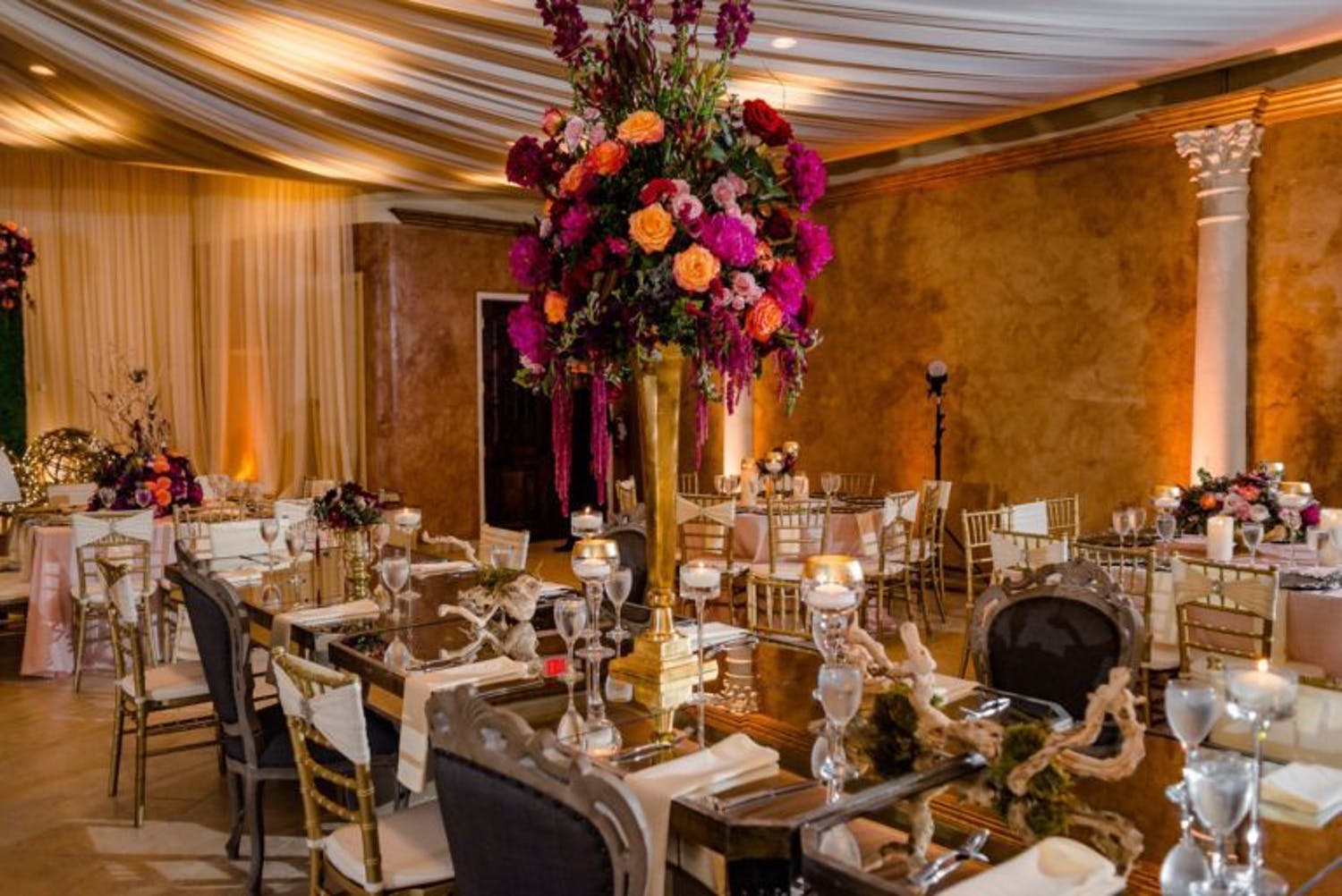 Vibrant Wedding with Bold Floral and Driftwood Centerpieces Planned by Events with Darrell of Houston, TX | PartySlate