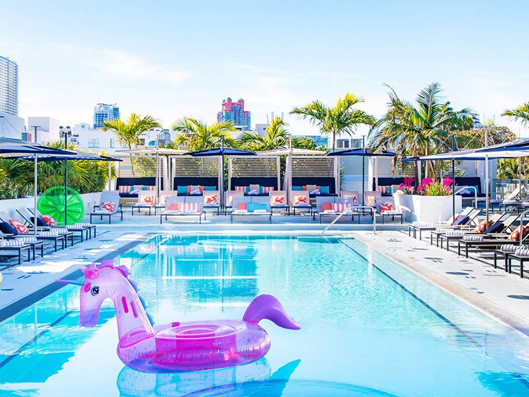 Pool with Purple Unicorn Floating Devise at Moxy Miami South Beach | PartySlate