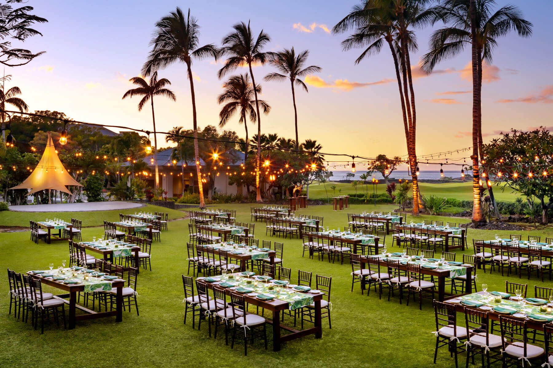 Plantatioon Estate at Fairmount Orchid Luxury Hotel With String Lights Over Tables at Sunset | PartySlate