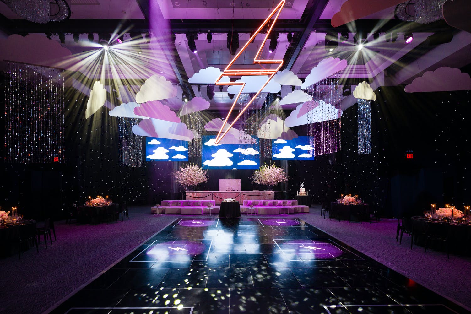 Thunderstorm Celebration with Lightniing Bolts and Thunder Clouds with Purple and Dark Colors and Dance Floor | PartySlate