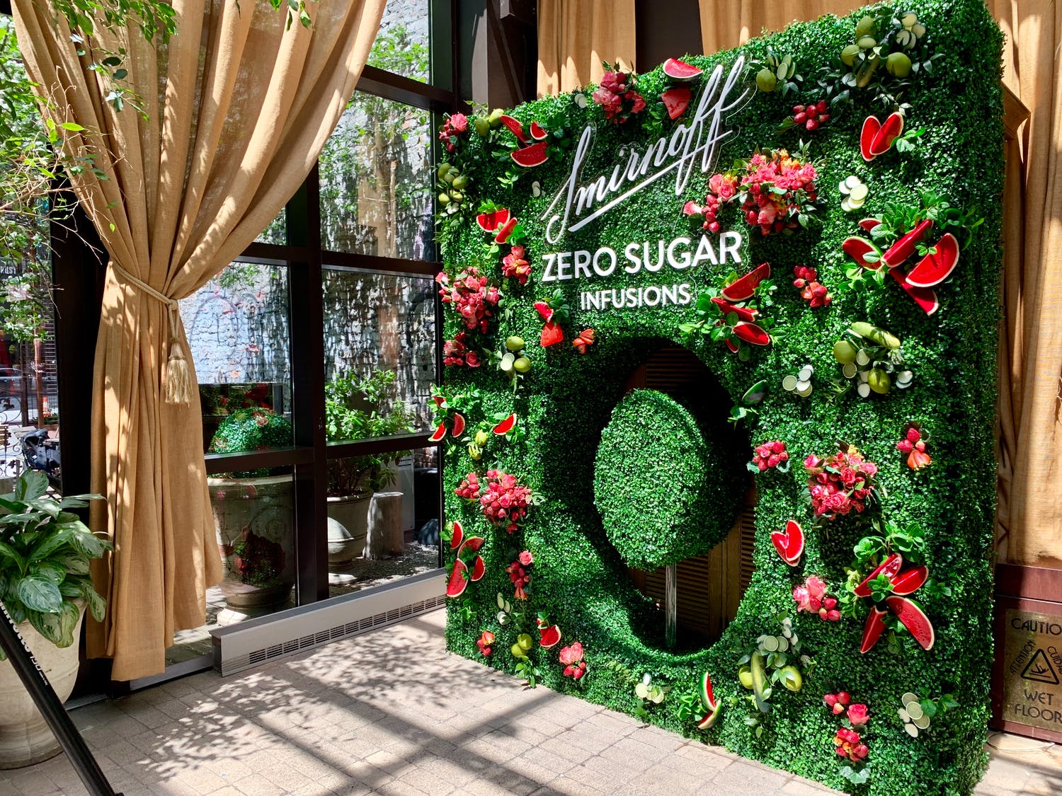 Boxwood signage with fruit décor at Smirnoff Zero Sugar Infusions launch | PartySlate