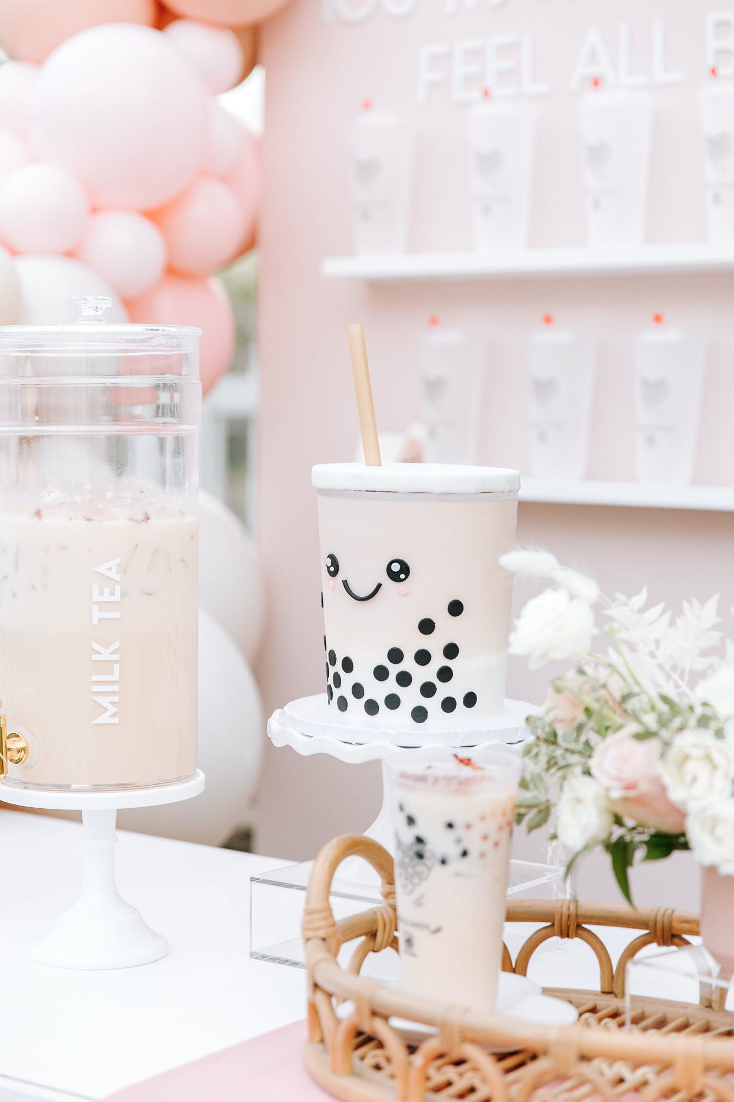 Boba Tea Themed Celebration With Pastel Pink and White Décor and Smily Faced Boba Tea Desserts | PartySlate