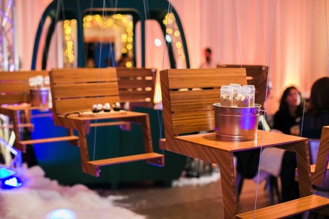 Catering presented on a mini ski lift design | PartySlate