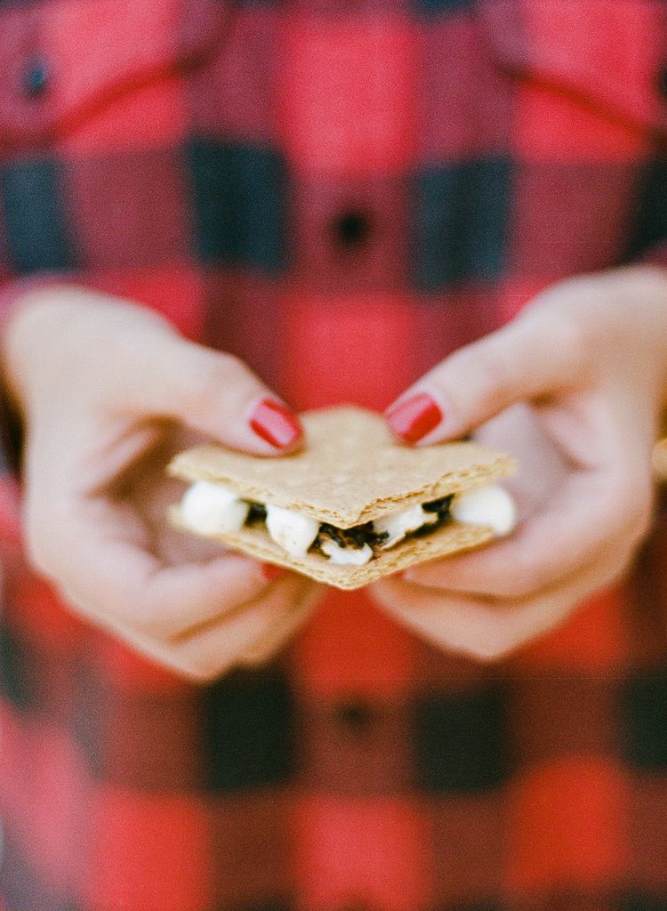 Apres-Ski Holiday Party at Private Residence A smores bar sign with a smore | PartySlate