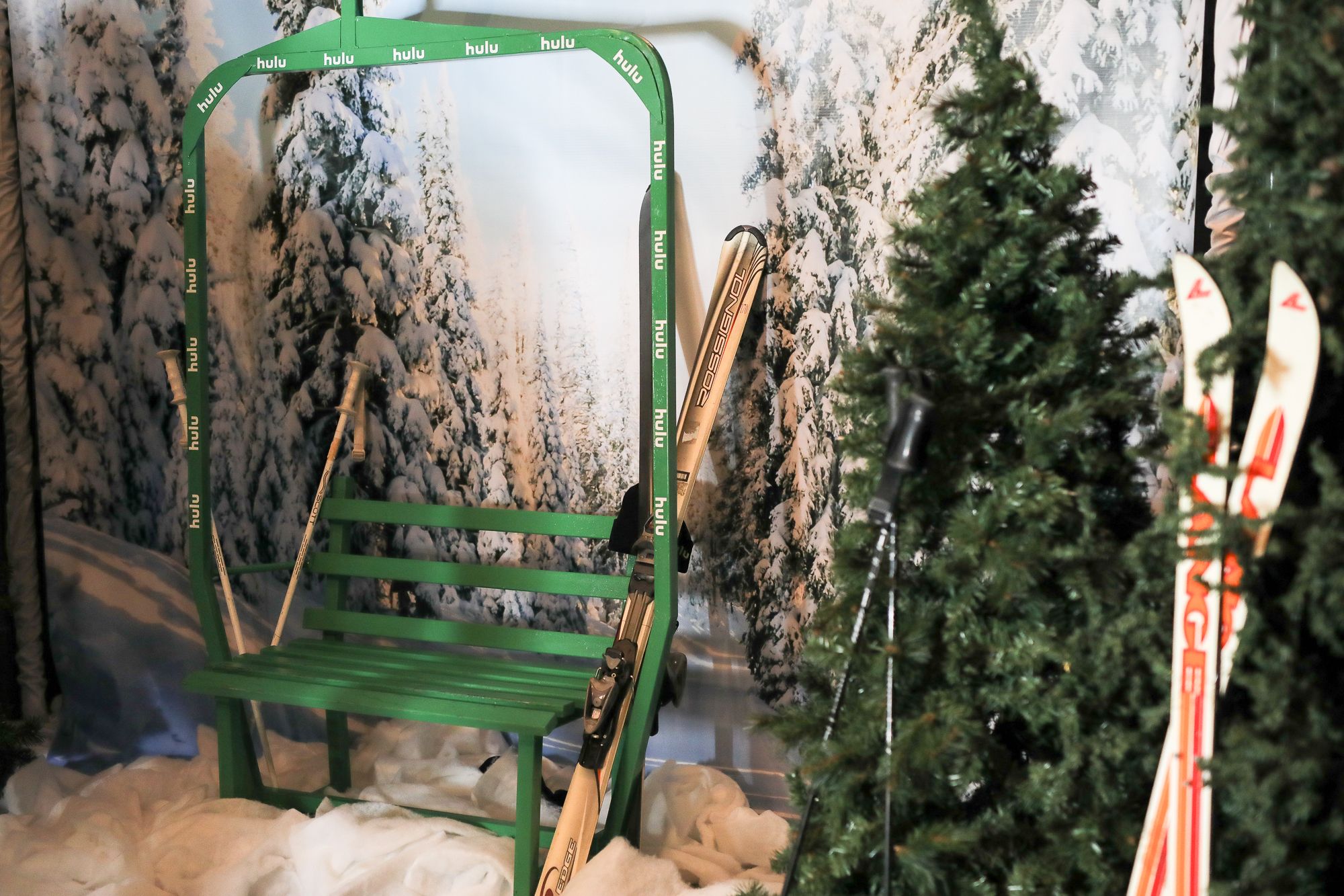 A ski lift prop with a fake background designed for a photo op | PartySlate