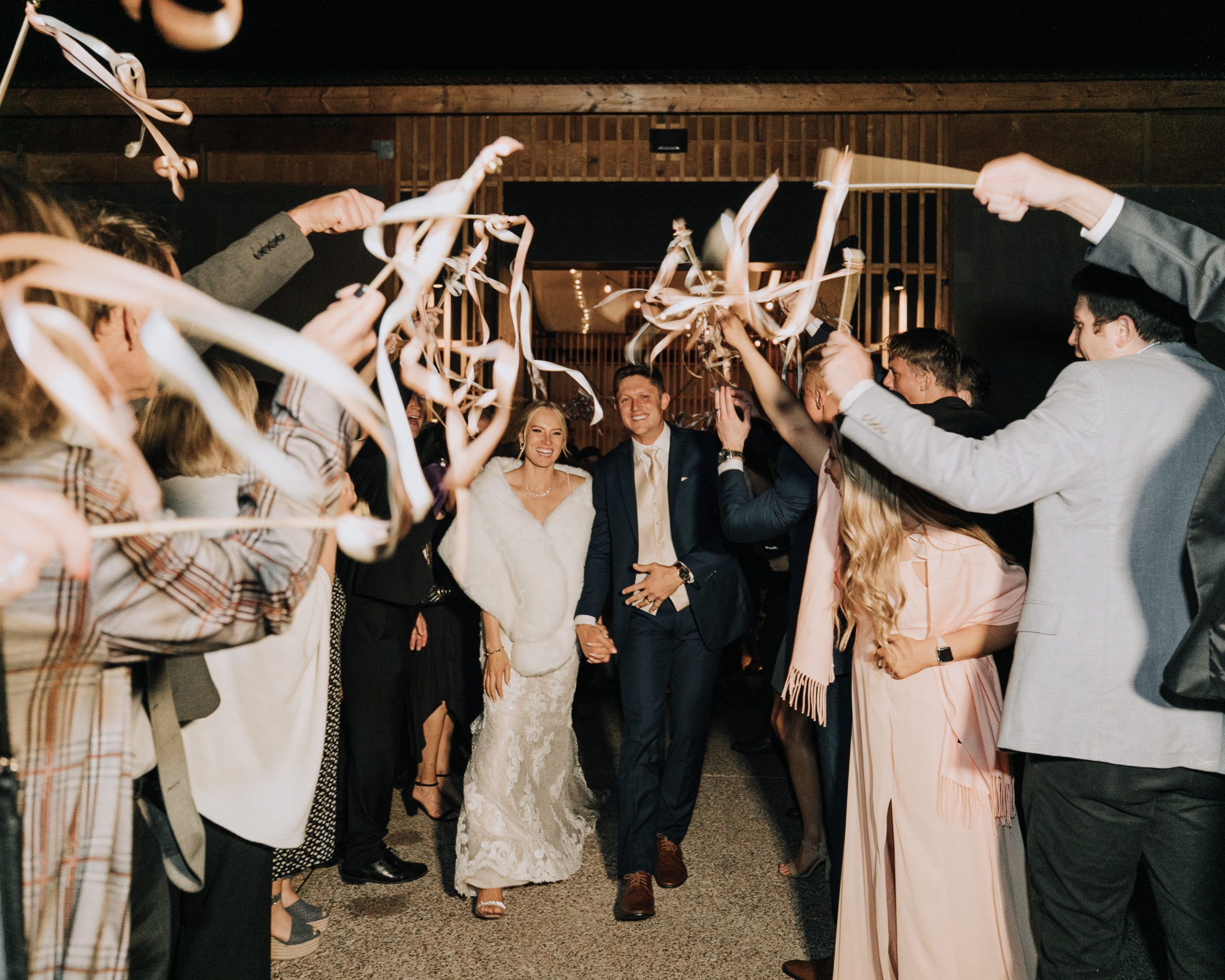 Arizona Spring Wedding with Modern Tropical Desert Vibe at The Paseo Event Venue Wedding Exit | PartySlate