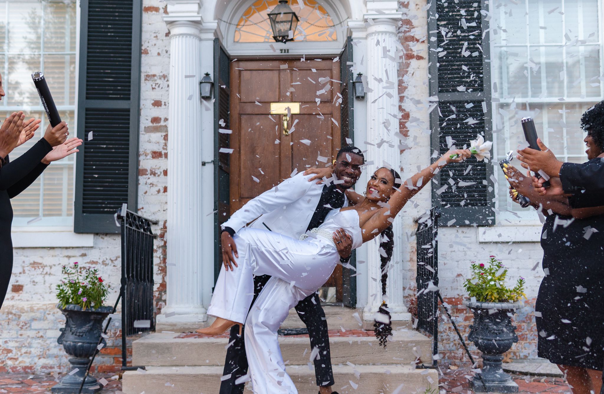 Minimalist Micro Wedding With Couple Outside Venue In Confetti | PartySlate