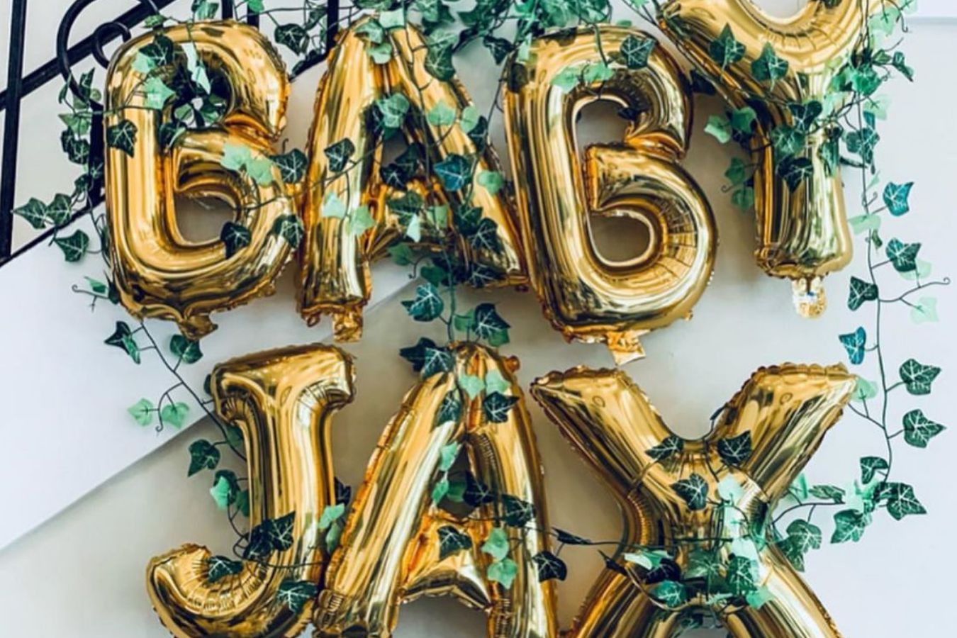 Baby Jax gold balloons with vines | PartySlate