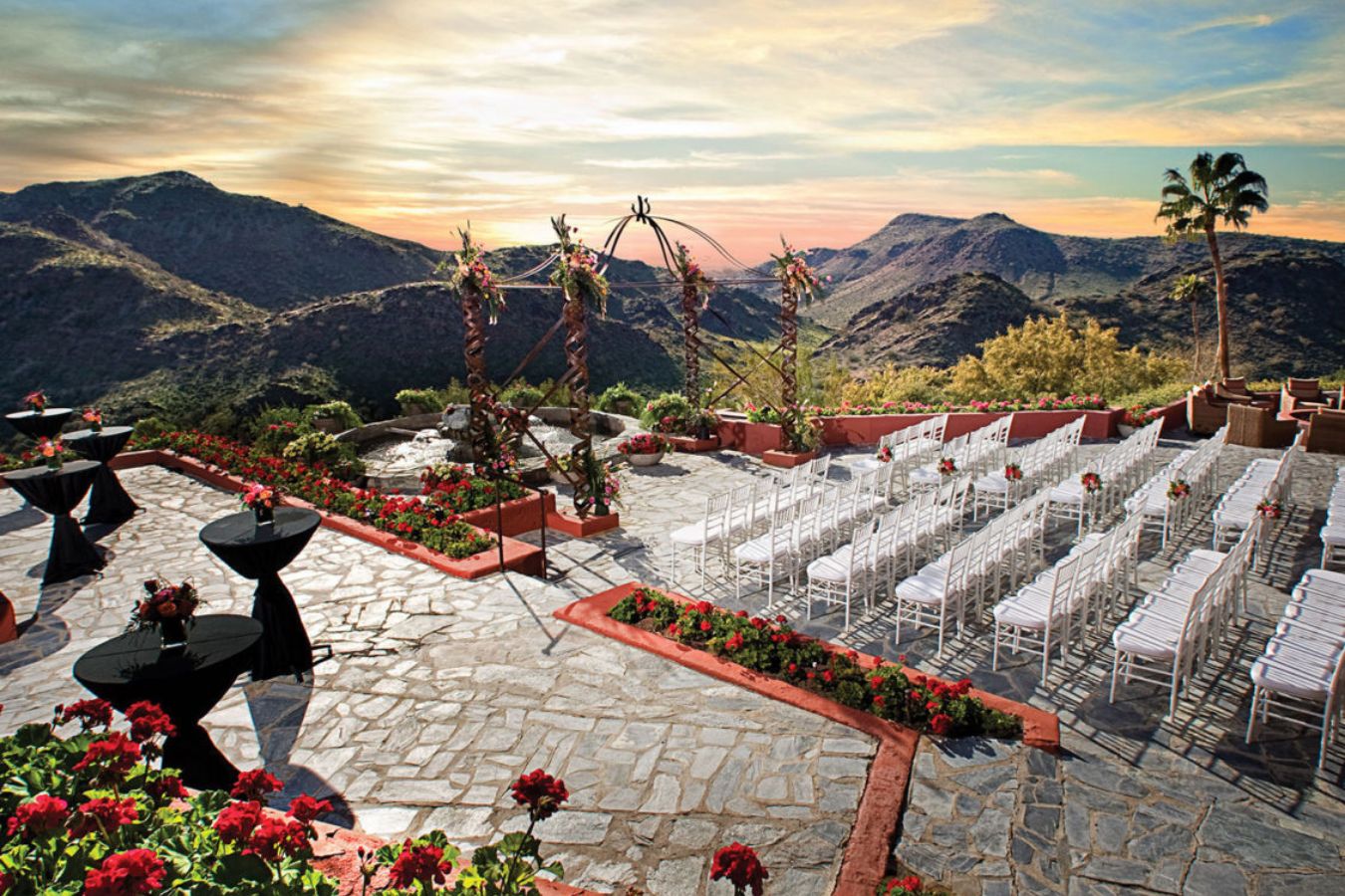 Wedding Event Space in Phoenix Overlooking Mountains With Chairs, Aisle, and Alter With Florals | PartySlate
