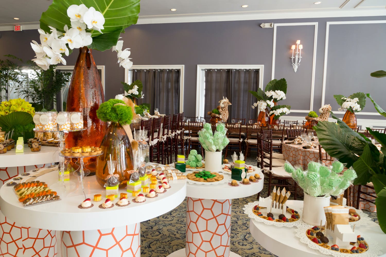 Savanna theme baby shower with giraffe-patterned tablescapes | Partyslate