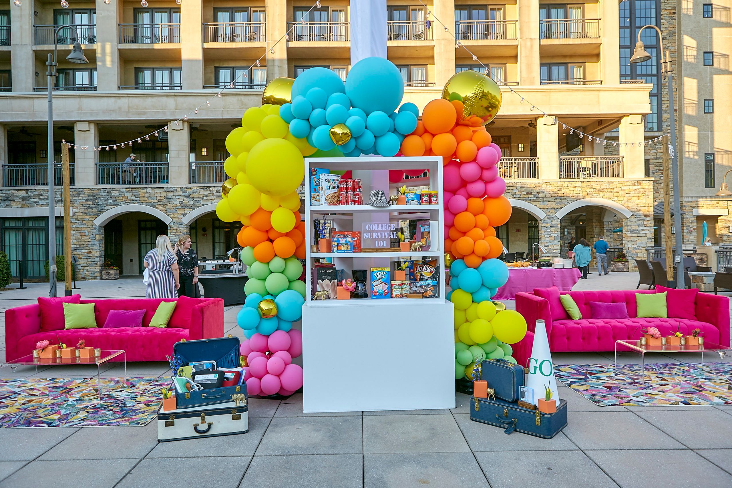 colorful balloon arch at graduation party | PartySlate