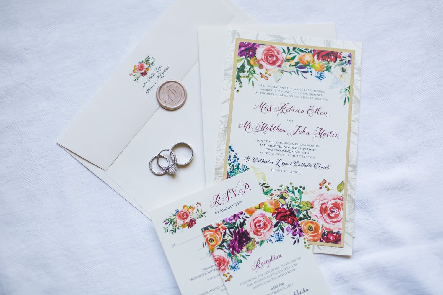 Wedding invitation with bright and colorful flowers | PartySlate