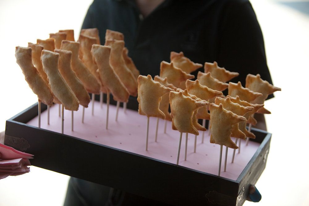 food in the shape of states on a tray to be passed around | PartySlate