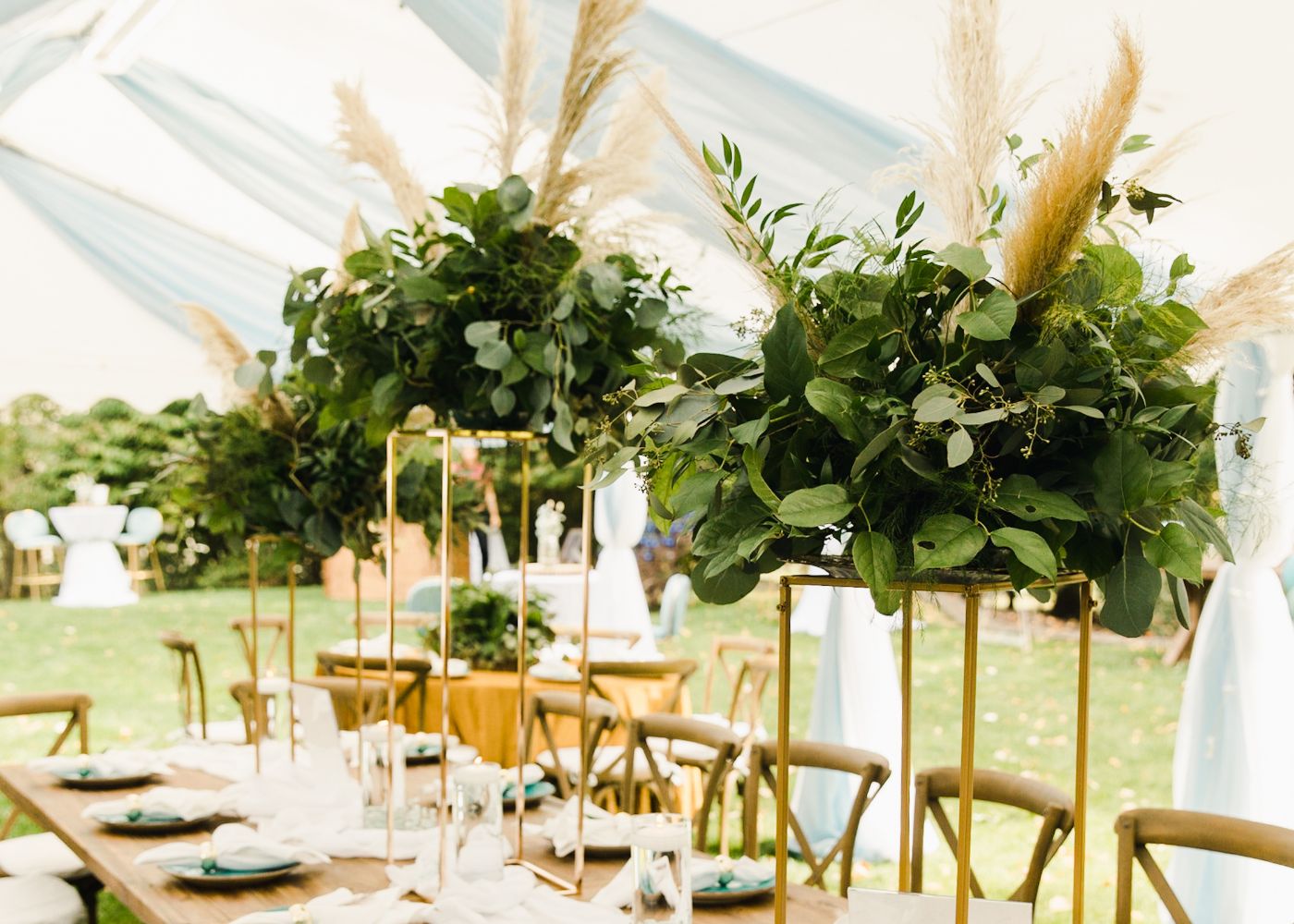 Centerpieces filled with greenery
