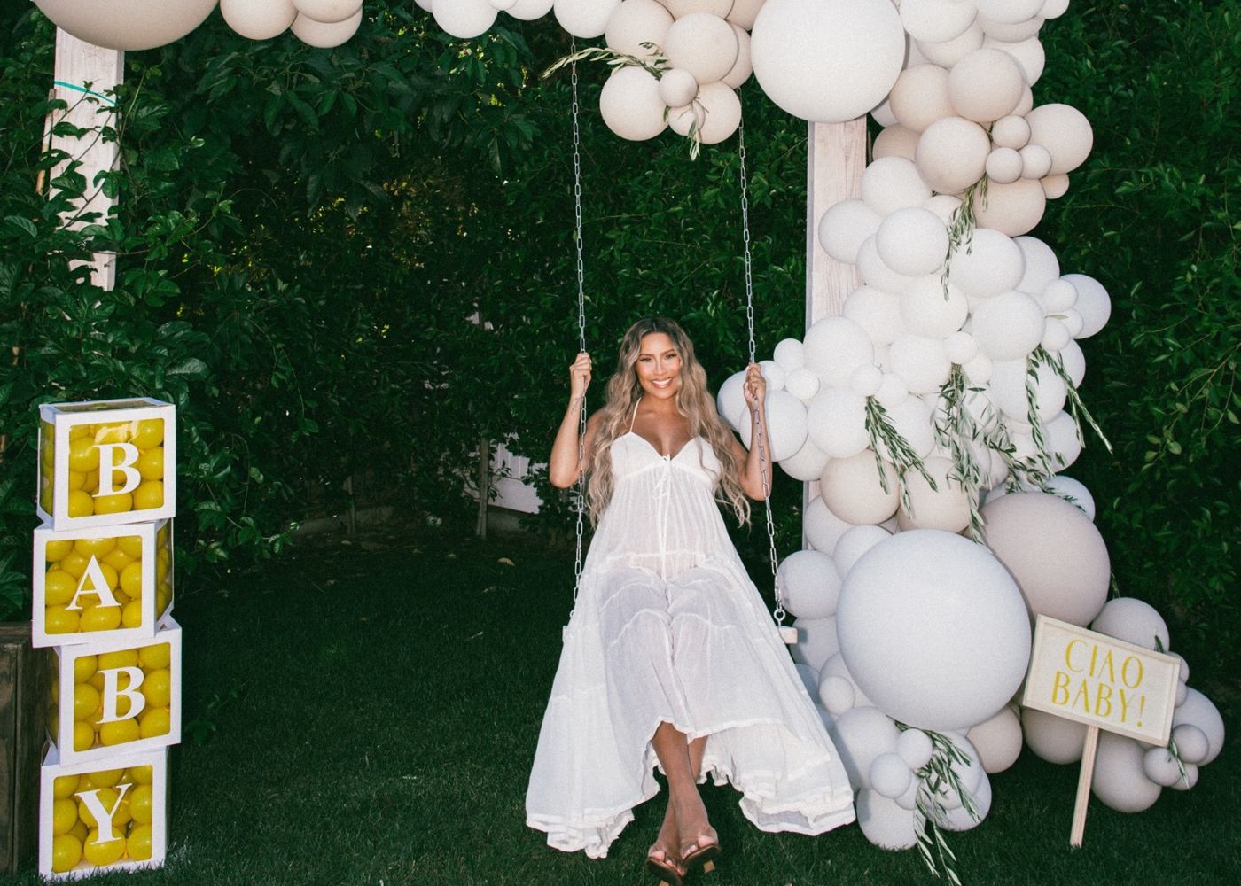 Mother-to-be on a swing