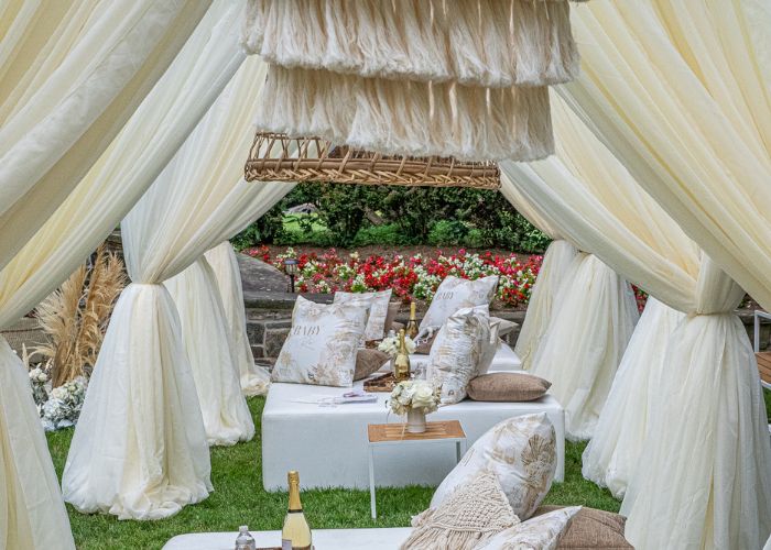 White drapery over a seating area